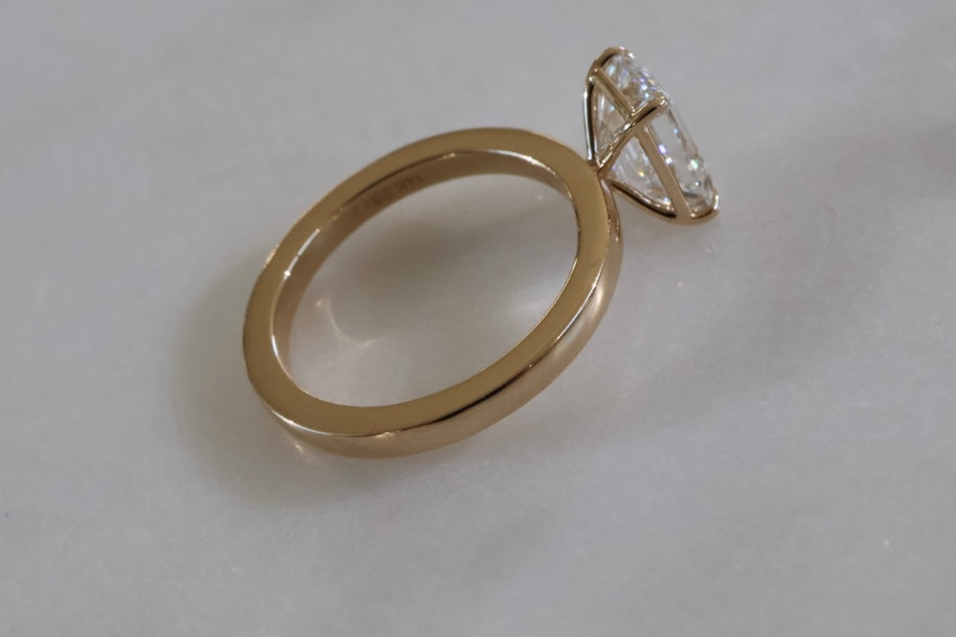 2ct Emerald Cut Diamond Solitaire Ring Yellow Gold