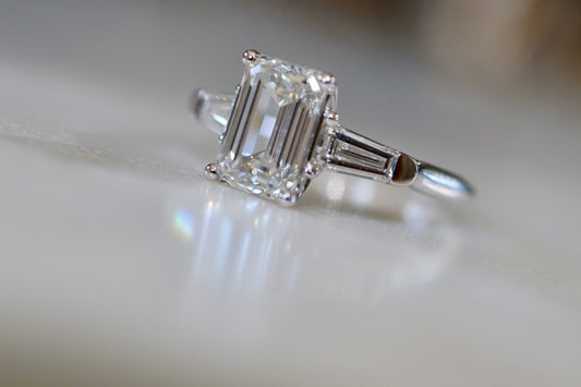 2.5ct Emerald cut Diamond Trilogy Ring White Gold