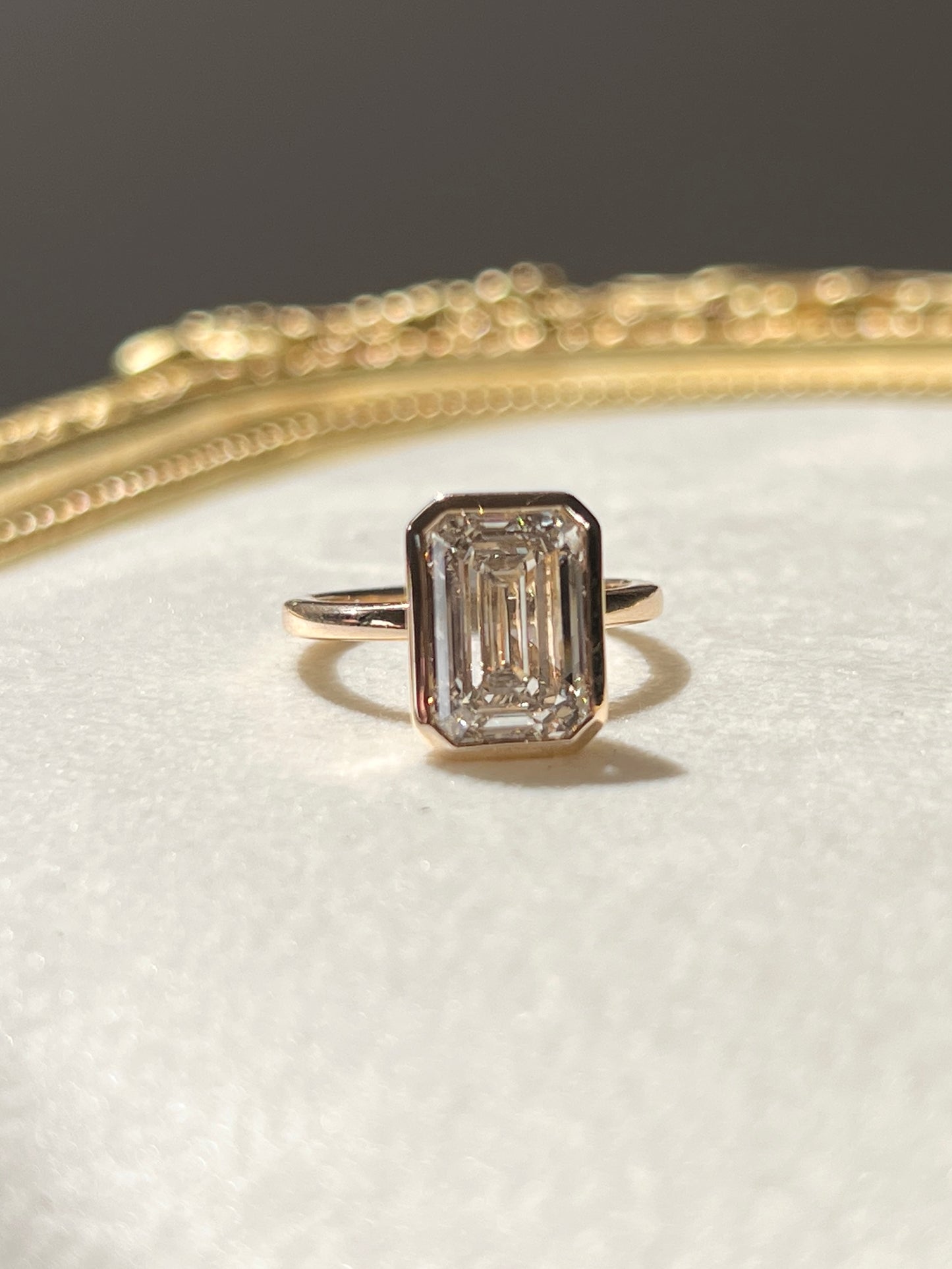 5ct Bezel Set Emerald Cut Diamond Ring