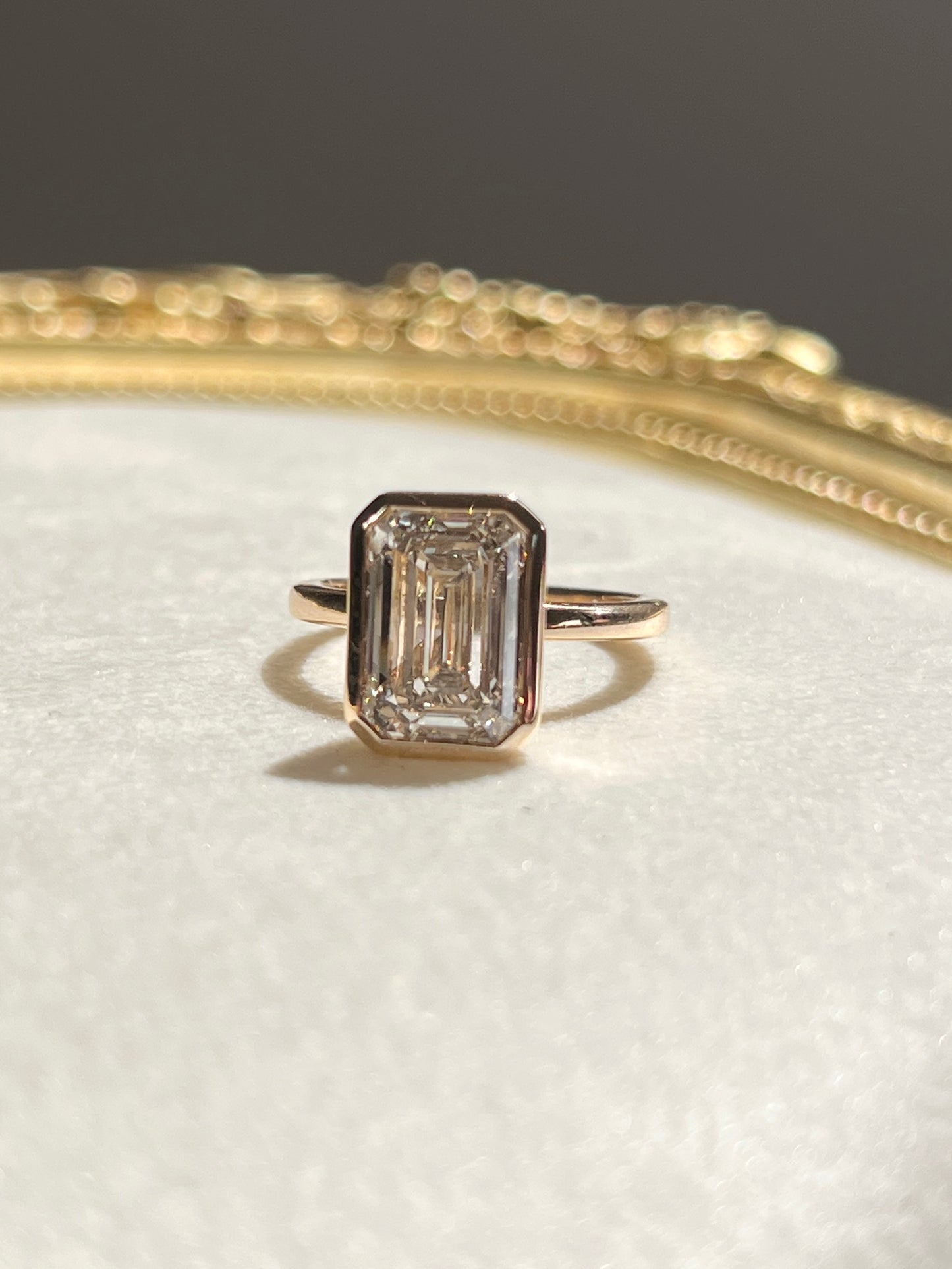 5ct Bezel Set Emerald Cut Diamond Ring