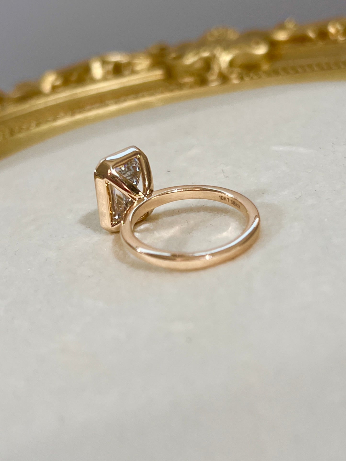 5ct Bezel Set Emerald Cut Diamond Ring