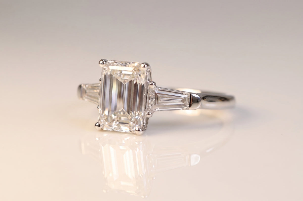 Zara emerald-cut diamond trilogy ring