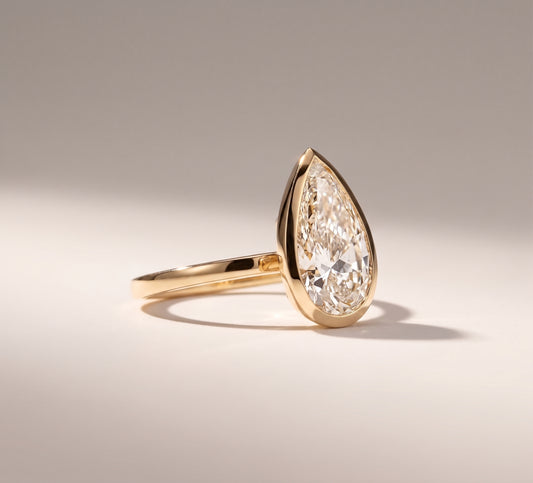 Hannah | 5ct Bezel Set Pear Cut Diamond Ring