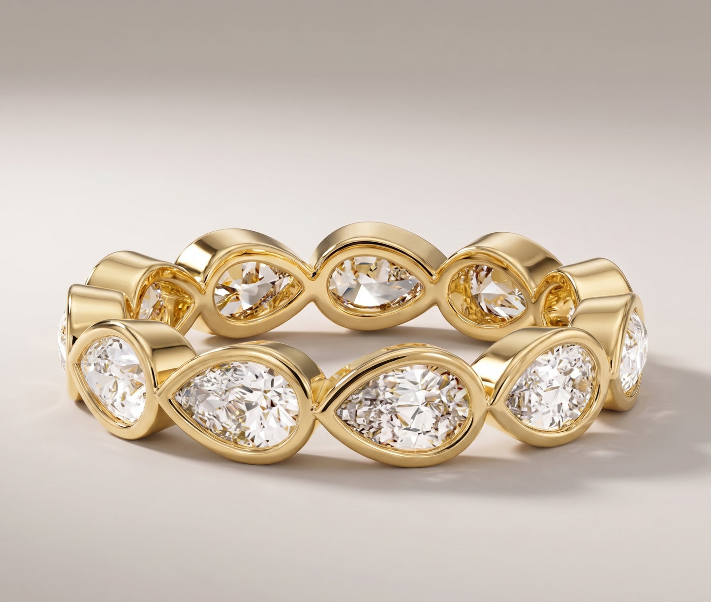 East-West Pear Diamond Eternity Band | Bezel Set